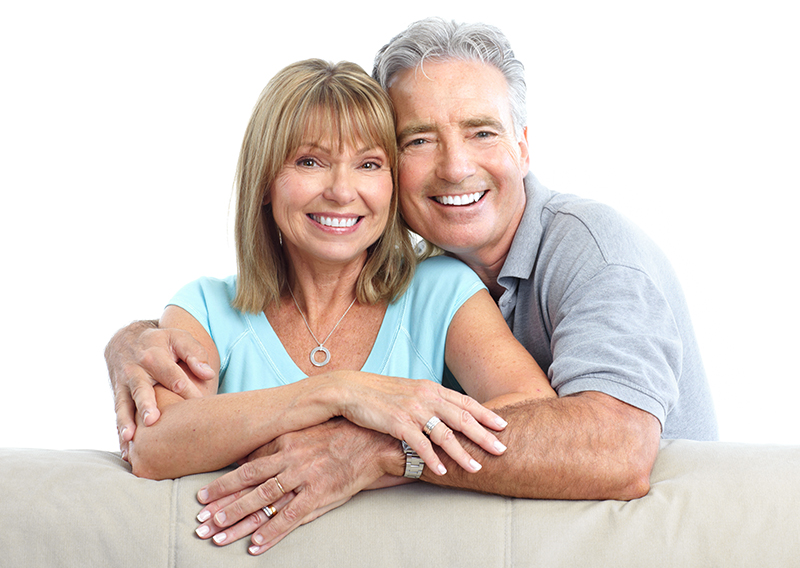 Senior Happy Couple With Dental Implants From Pearl Dentistry
